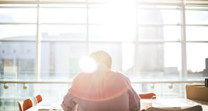 Man sitting alone in a break room