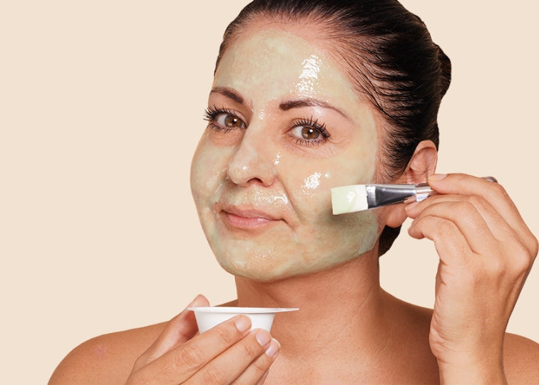 Lady using Ebanel Collagen + Peptide infusion mask